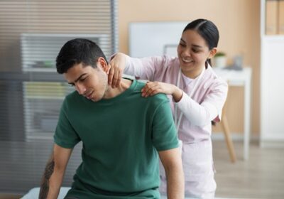 doctor-helping-patient-rehabilitation